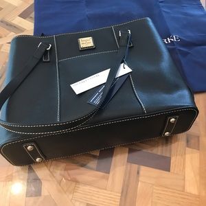 Brand new Dooney Bourke Black Lexington. Has tags never used